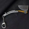 Loaded Axe keychain — black iron mini metal accessory.