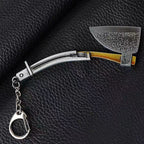 Loaded Axe keychain — black iron mini metal accessory.