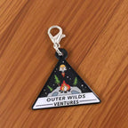 Outer Wilds metal keychain pendant — cosmic adventurer style