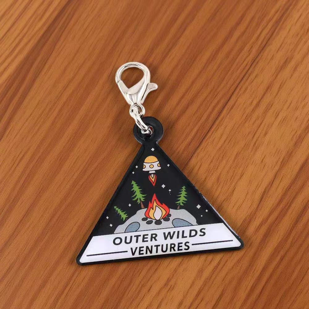 Outer Wilds metal keychain pendant — cosmic adventurer style