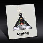 Outer Wilds metal keychain pendant — cosmic adventurer style