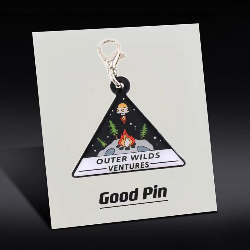 Outer Wilds metal keychain pendant — cosmic adventurer style