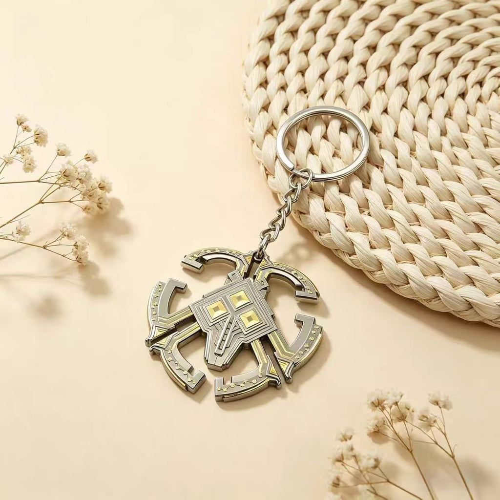 Nomai keychain from Outer Wilds — detailed metal keyring.