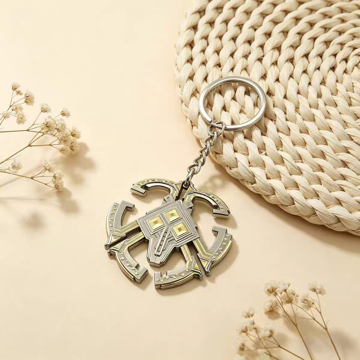 Nomai keychain from Outer Wilds — detailed metal keyring.