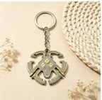 Nomai keychain from Outer Wilds — detailed metal keyring.