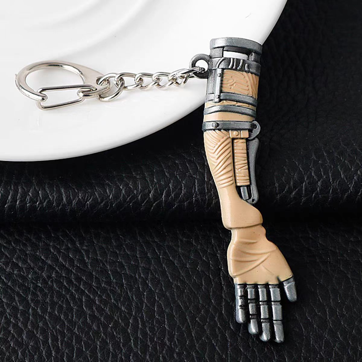 Shinobi Prosthetic keychain — mechanical arm mini metal.